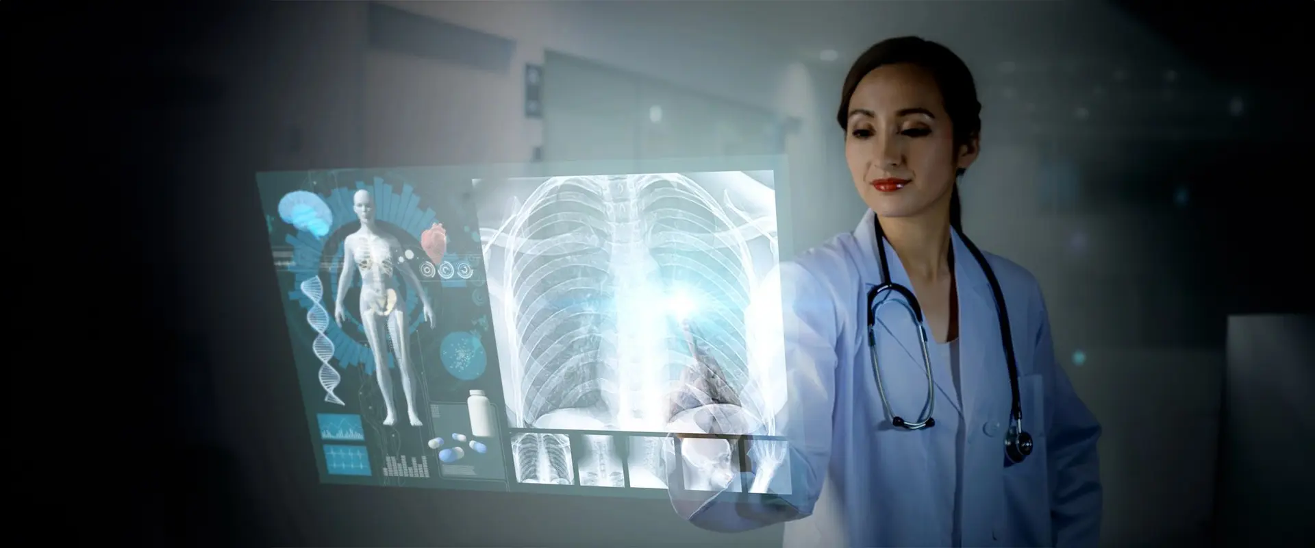 A woman in scrubs holding up an x-ray.